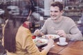 Pretty charming couple eating together Royalty Free Stock Photo