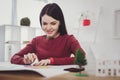 Pleasant delighted woman doing her job Royalty Free Stock Photo