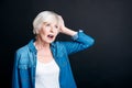 Pleasant elderly woman having an idea Royalty Free Stock Photo