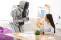 Pleasant girl talking with robot Royalty Free Stock Photo