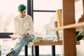 Pleasant hard working woman sitting in the office Royalty Free Stock Photo