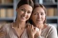 Affectionate bonding two female generations family portrait. Royalty Free Stock Photo