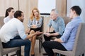 Pleasant nice people having a group discussion Royalty Free Stock Photo