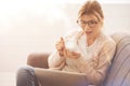 Pleasant nice woman having tea Royalty Free Stock Photo