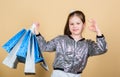 Pleasant price. Sales and discounts. Small girl with shopping bags. retail. Holiday purchase saving. Cheerful child Royalty Free Stock Photo