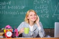 Pleasant relax after classes. Working conditions which prospective teachers must consider. Woman smiling teacher holds Royalty Free Stock Photo