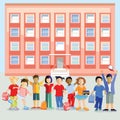 Pleasant school children in front of the school Royalty Free Stock Photo