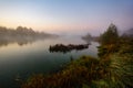 Pleasant sunrise on the river. Dew on the shore Royalty Free Stock Photo