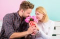 Pleasant surprise for lady. Bouquet favorite flowers as romantic gift. Man gives bouquet flowers to girlfriend