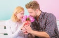 Pleasant surprise for lady. Bouquet favorite flowers as romantic gift. Man gives bouquet flowers to girlfriend