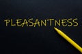 Pleasantness Yellow Pen with yellow text own rent at the black background Royalty Free Stock Photo