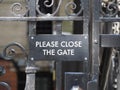 please close the gate sign Royalty Free Stock Photo