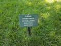 Please do not walk on grass sign and green lawn