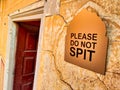 Please donot spit banner on a wall Royalty Free Stock Photo