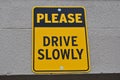 Please Drive Slowly Sign