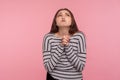 Please god, I`m begging! Portrait of unhappy woman looking up with beseeching imploring expression, praying Royalty Free Stock Photo