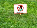 Please keep off the lawn sign in Spanish language. NO PISAR EL CESPED. Royalty Free Stock Photo