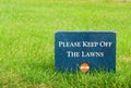 Please keep off the lawns Ã¯Â¿Â½ stone sign in the park Royalty Free Stock Photo