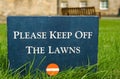 Please keep off the lawns Ã¯Â¿Â½ stone sign in the park