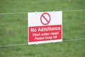 Please keep off sports grass pitch under repair sign Royalty Free Stock Photo