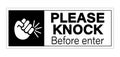 Please knock before enter. Black and white information sign with symbol and text Royalty Free Stock Photo