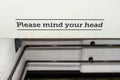 Please Mind Your Head