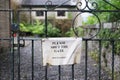 Please shut the gate sign at entrance to residential garden