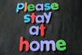 Please stay at home slogan due to Coronavirus pandemic outbreak around the world. Royalty Free Stock Photo