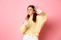 Please stop, enough. Displeased and reluctant young woman stay back, showing block gesture, raising stretched out hands Royalty Free Stock Photo