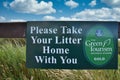 Please take your litter home with you sign Royalty Free Stock Photo