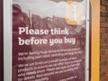 Please think before you buy sign outside Sainsburys supermarket in Golders Green, London, UK.