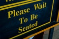 Please Wait To Be Seated