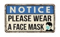 Please wear a face mask vintage rusty metal sign