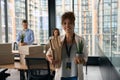 Pleased company employee and coworkers preparing for office moving Royalty Free Stock Photo