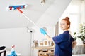 Maid woman with mop. House cleaning service concept. Royalty Free Stock Photo