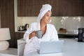Pleased woman drinking coffee at home Royalty Free Stock Photo