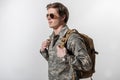 Glad male soldier holding his rucksack Royalty Free Stock Photo