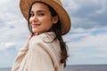 pleased young woman in sun hat Royalty Free Stock Photo