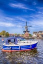 Pleasure Boat in Harlem With De Adriaan Windmill