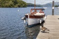Pleasure Boat moored at Boweness on Windermere, Lake Windermere. Royalty Free Stock Photo