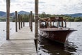 Pleasure Boat moored to jetty on Derwent Water, Keswick. Royalty Free Stock Photo