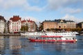 Pleasure boat runs along the rivers of Stockholm Royalty Free Stock Photo