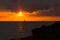 Pleasure boat is sailing in a harbor to the Gulf of Riga in a sunset light, on cloudy weather Royalty Free Stock Photo