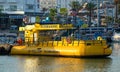 Pleasure boat Yellow submarine at the dock fishing harbor