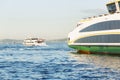 Pleasure boats on the Bosphorus in the summer setting sun. Space for text Royalty Free Stock Photo