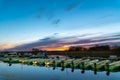 Pleasure boats and boats at dawn in the Bayou of lake Ladoga near the city of Novaya Ladoga Royalty Free Stock Photo