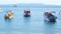 Pleasure boats moored off a beach Royalty Free Stock Photo