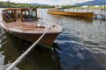 Pleasure Boats moored to jetty on Derwent Water, Keswick. Royalty Free Stock Photo