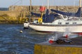 Pleasure boats on their moorings at Groomsport Harbor during a winter storm Royalty Free Stock Photo