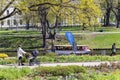 Pleasure boats with tourists cruise along the Riga river canal near Bastion park